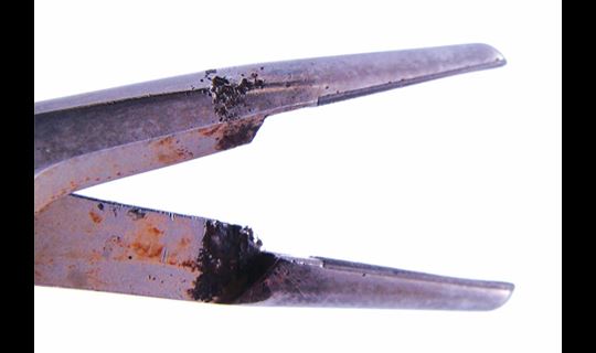 Rusted and corroded veterinary surgical instrument