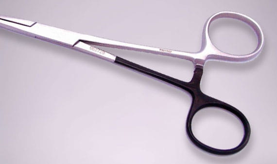 Left handed scissors determined by one black handle