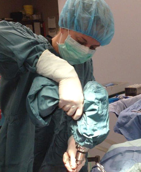 Surgical procedure with Arbutus drill and cover